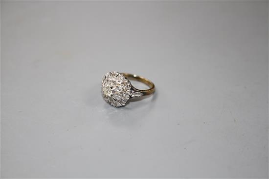 A 1960s 18ct gold and illusion set diamond cluster ring,